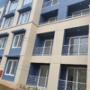 East-facing 1BHK flat for sale in Mogappair West, 682 sqft in a gated community with lift and car parking.